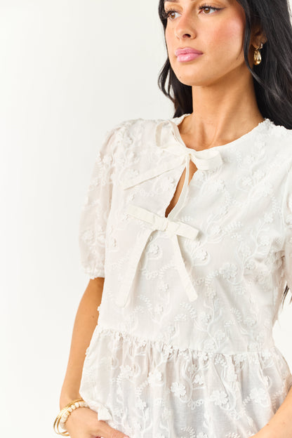 Off White Textured Floral Short Sleeve Peplum Blouse